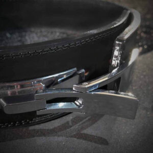 Close up image of the stainless steel buckle of a powerlifting belt.